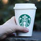hand holding starbucks cup